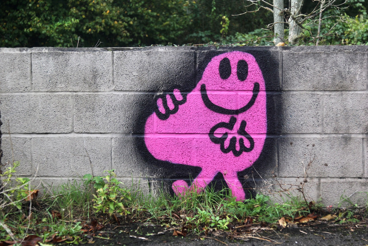 Mr Greedy painted on a wall