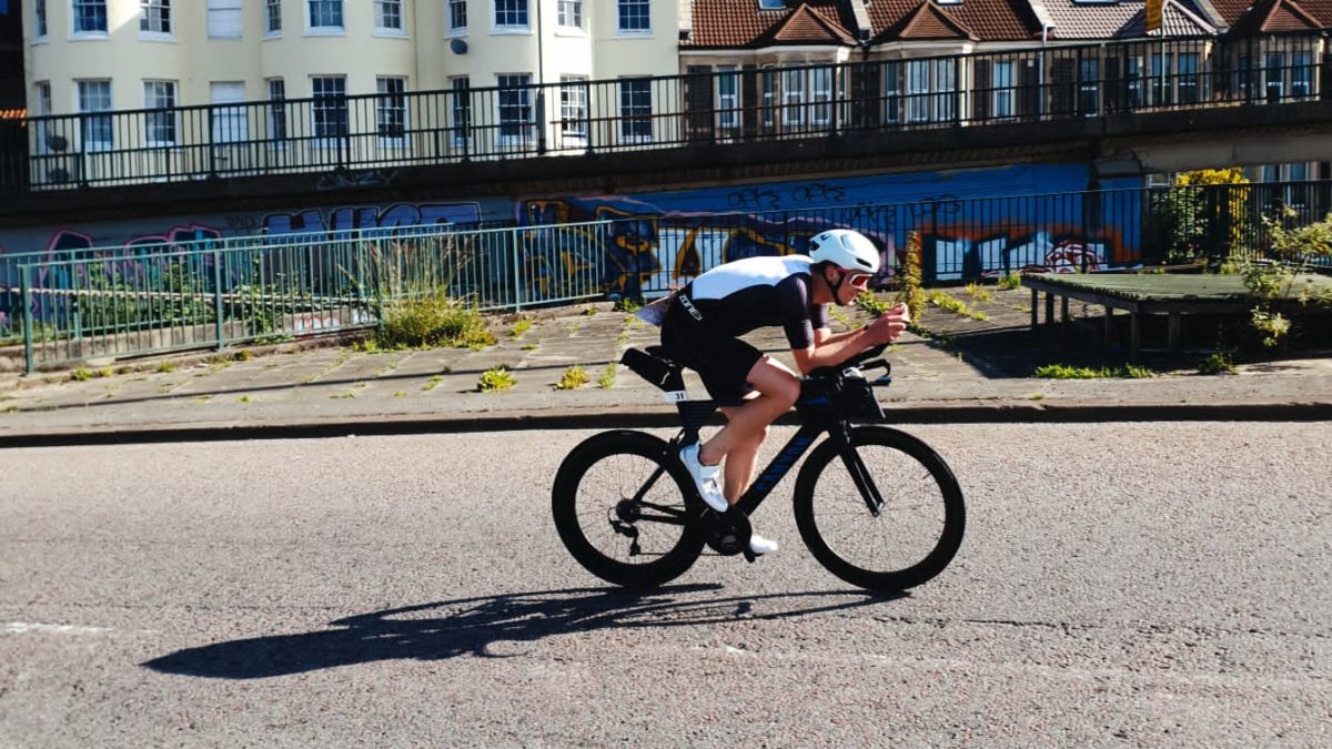 A person racing on a bike