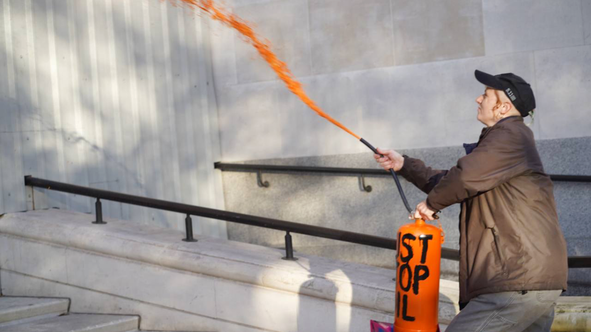 Just stop oil activist spraying orange paint with an extinguisher