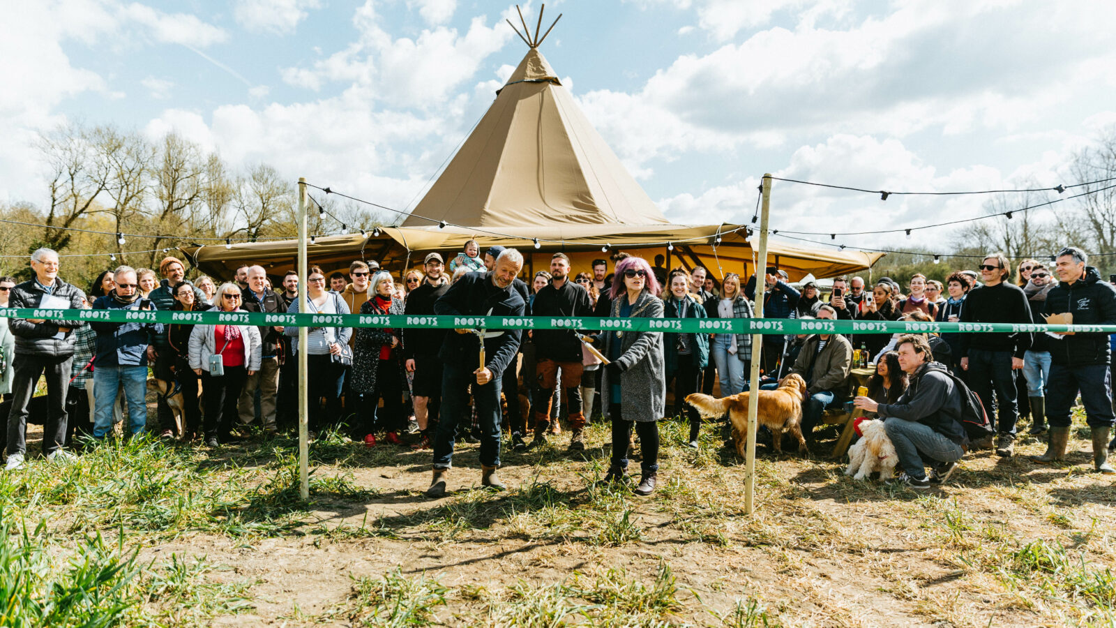 Group of people in an Root's allotment opening
