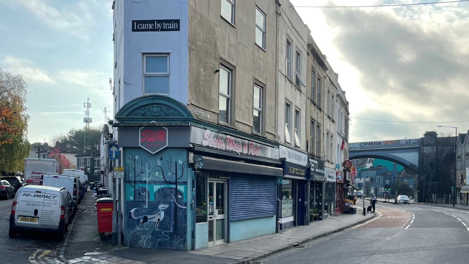 Shake, Wrap & Roll with the Cheltenham Road arches in the distance