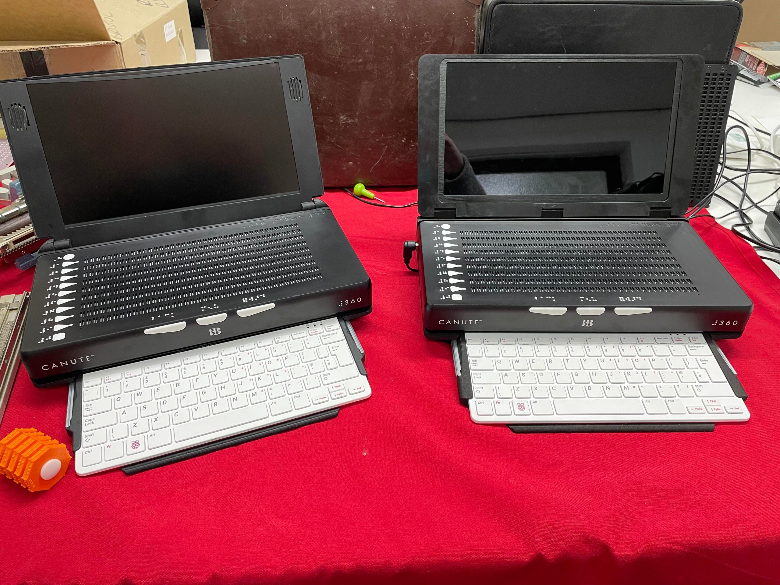 Two Braille gaming devices side by side which can be played by blind and partially sighted people