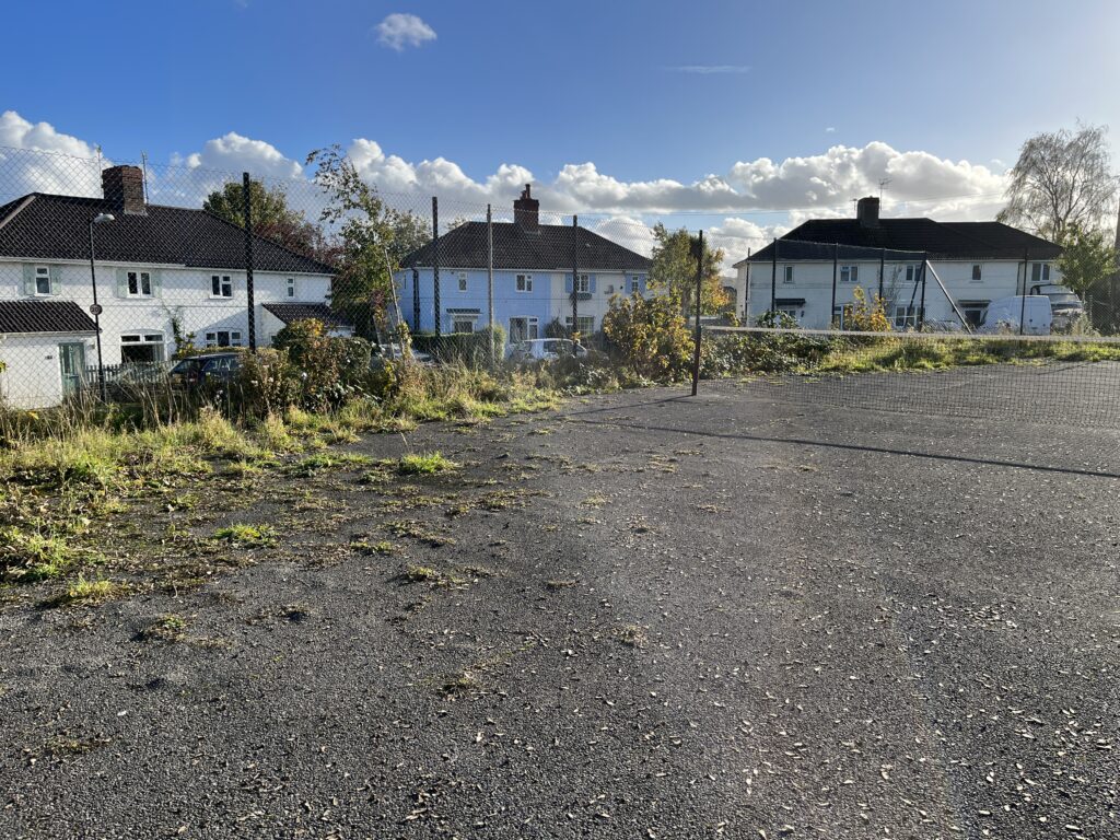 A abandoned tarmac tennis court