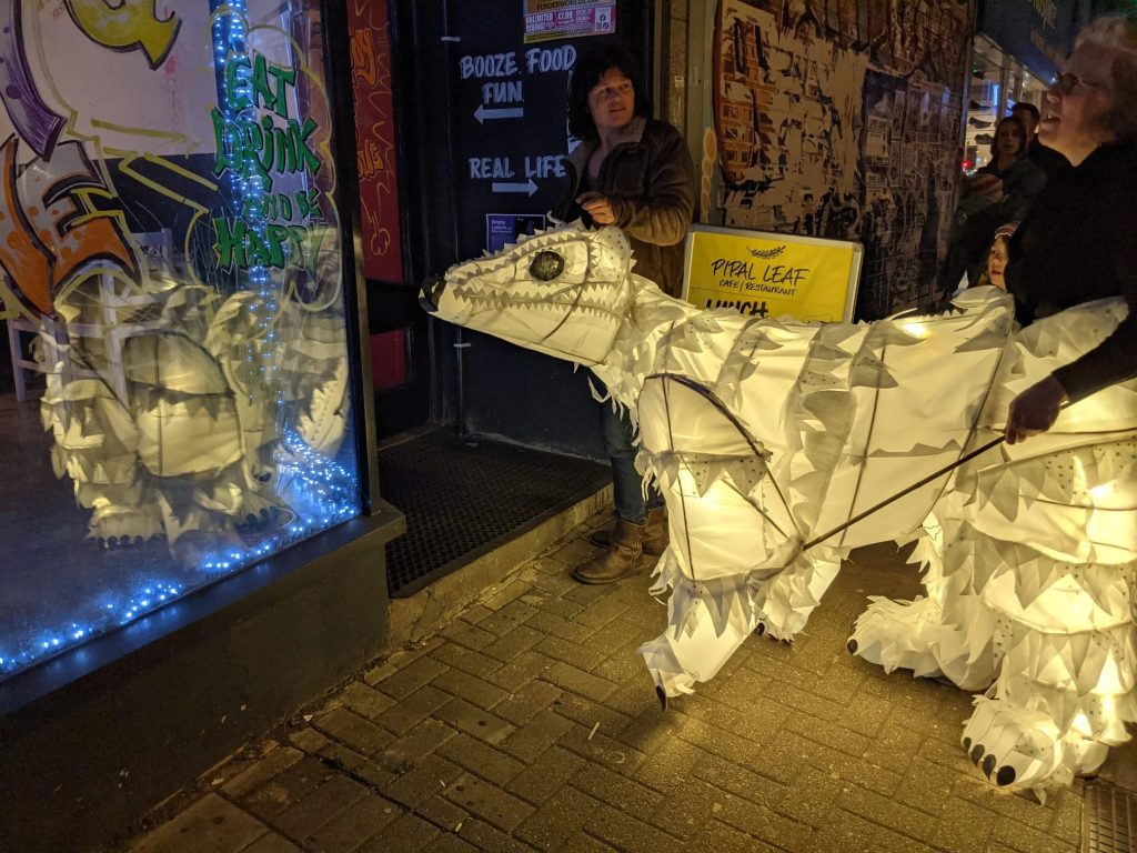 Later in the form of a polar bear, posed to look into a shop window