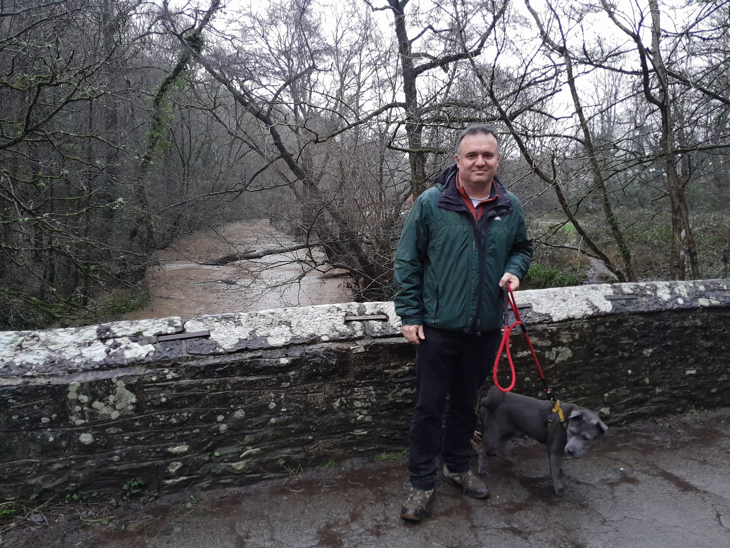 Man and his dog at Wickham Bridge in Eastville Park
