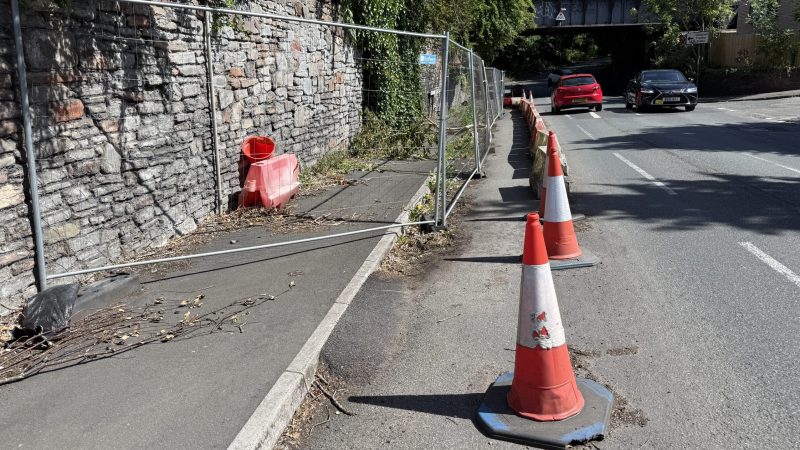 Residents in repair row over crumbling wall