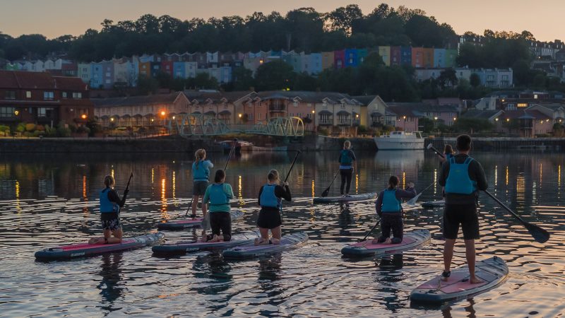 In photos: Paddleboarders welcome summer solstice