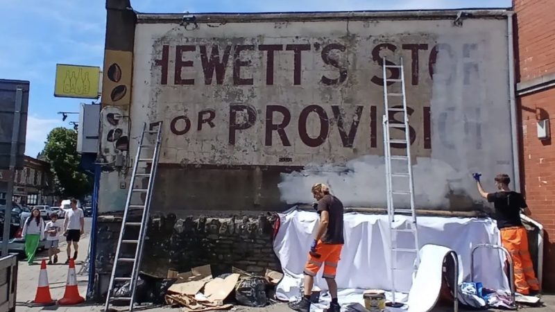 Ghost sign unveiled and then painted over